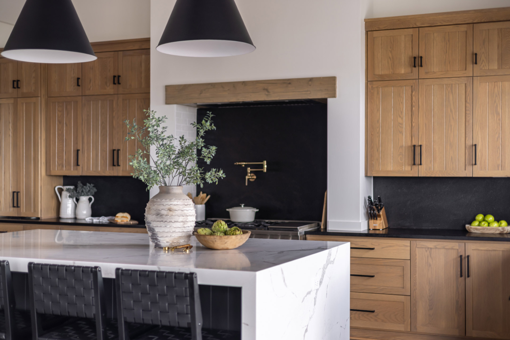 Kitchen with a marble table and wooden cabinets