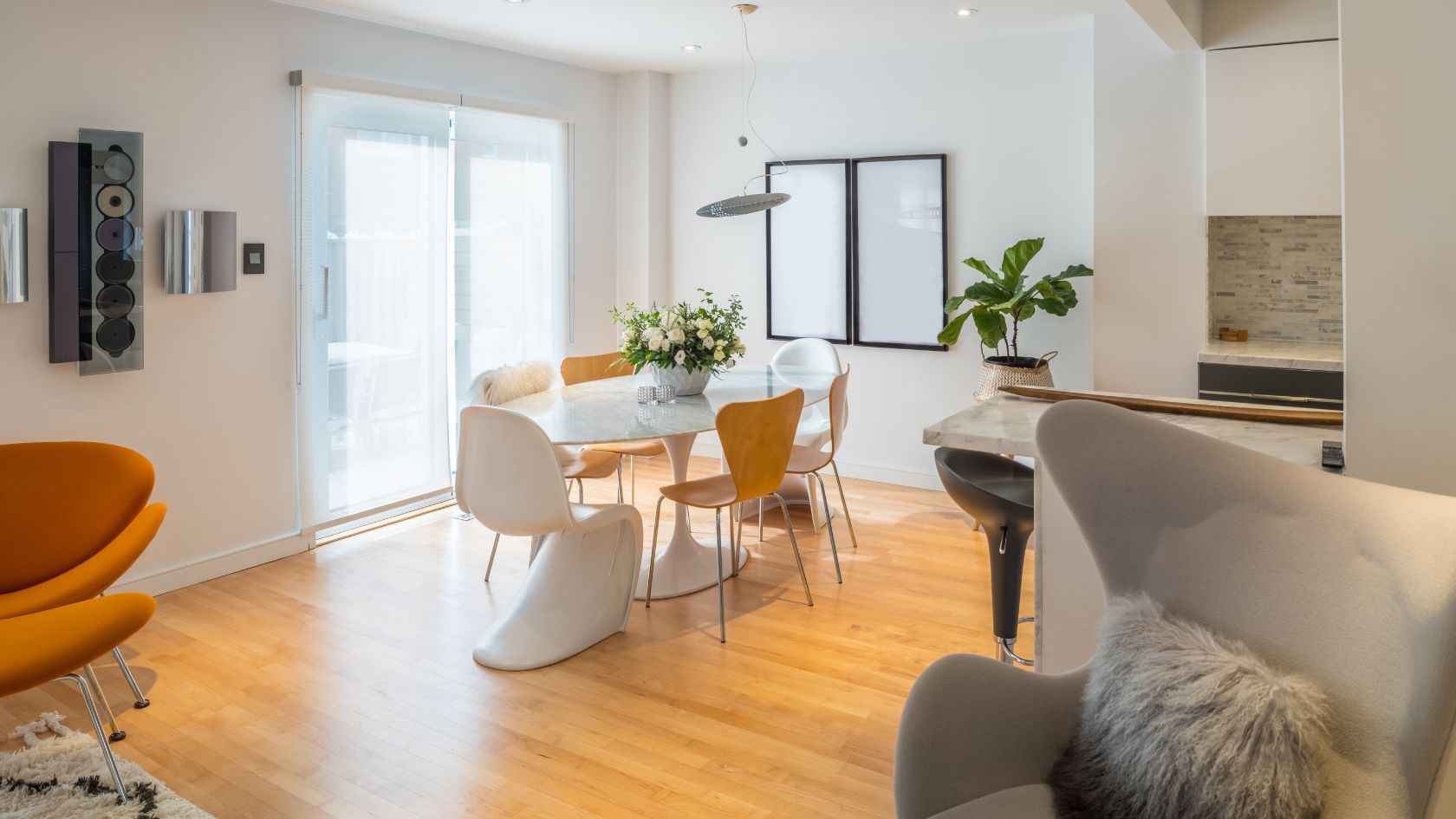 a dining room with a table and chairs