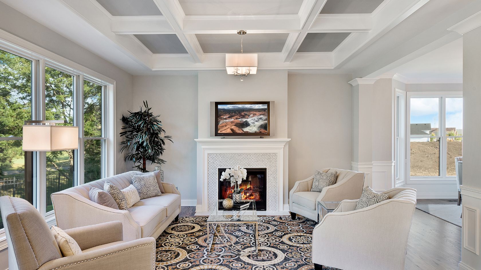 a living room with a fireplace and couches