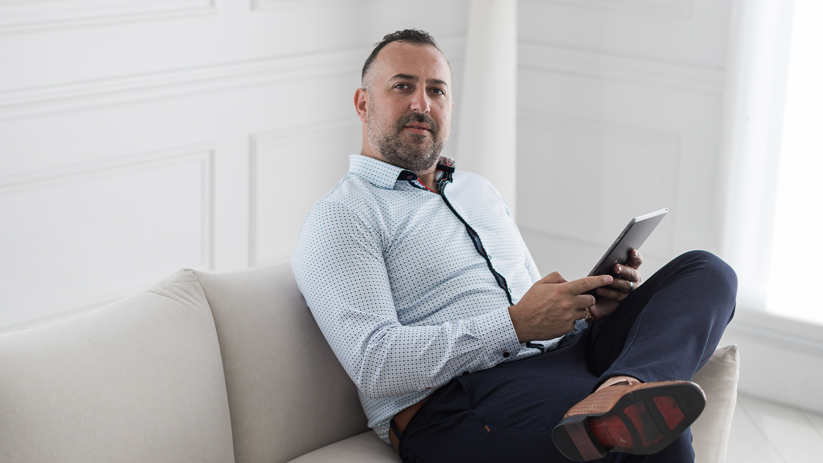 Professional real estate agent in a bright living room