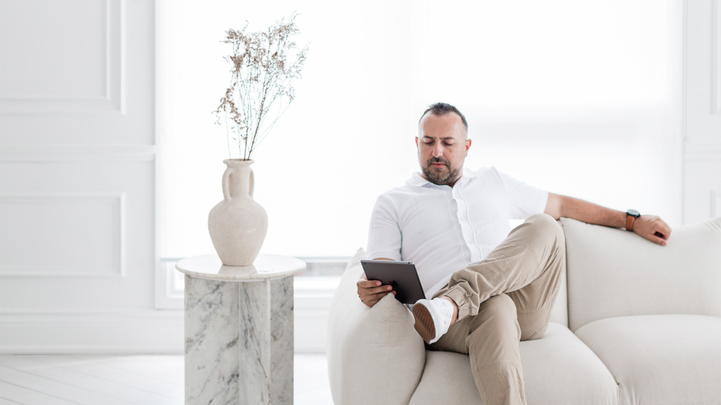 Professional portrait of Joseph Nicosia, Toronto real estate broker, in a bright room